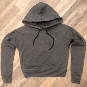 Cropped Dark Grey Charcoal Hoodie Asymmetrical creates peek a boo lower back